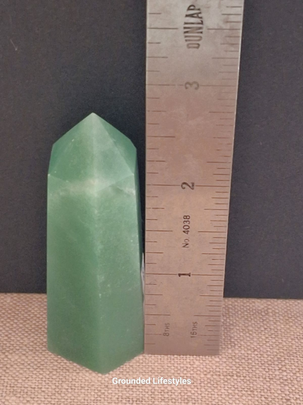 polished green aventurine point 2.75 inch showing quartz sparkle