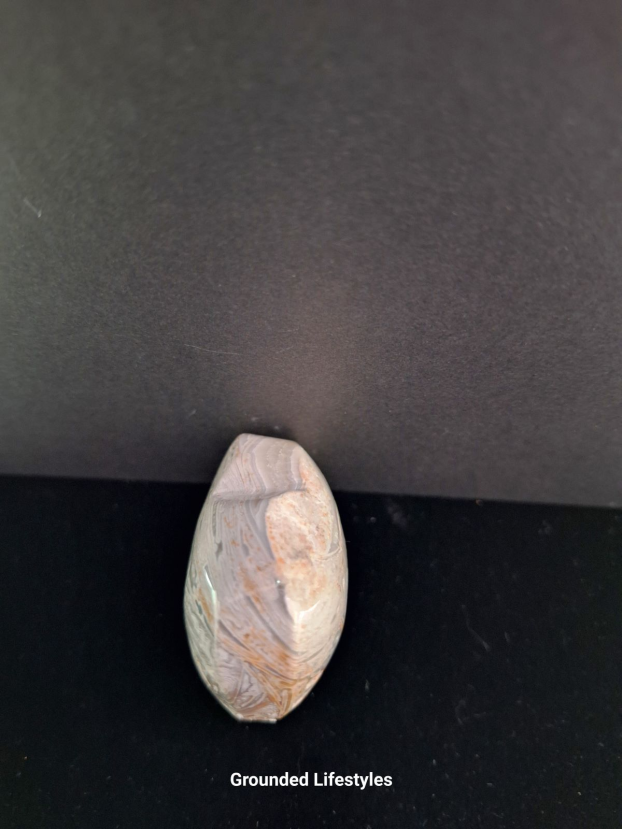 Natural lattice agate specimen showing angular pattern.