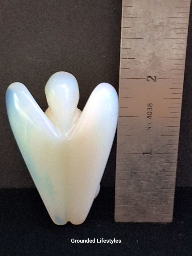 iridescent opalite angel figurine 2 inch symbolizing calm and clarity