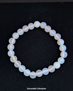 Polished opalite 6mm stretch bracelet with elastic cord.