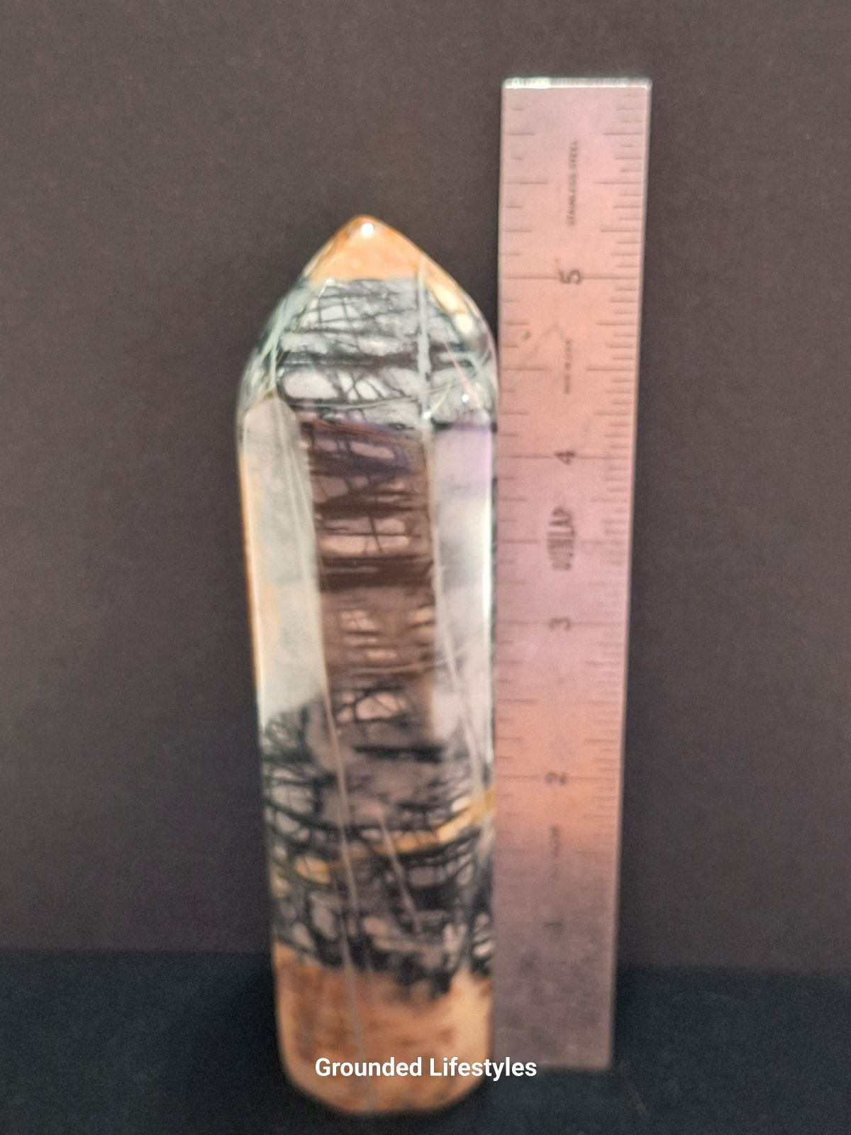 Hand-polished 5 inch Picasso Marble point from Utah.