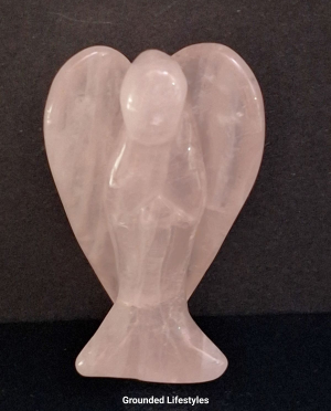 natural rose quartz angel carving from Brazil in soft translucent pink