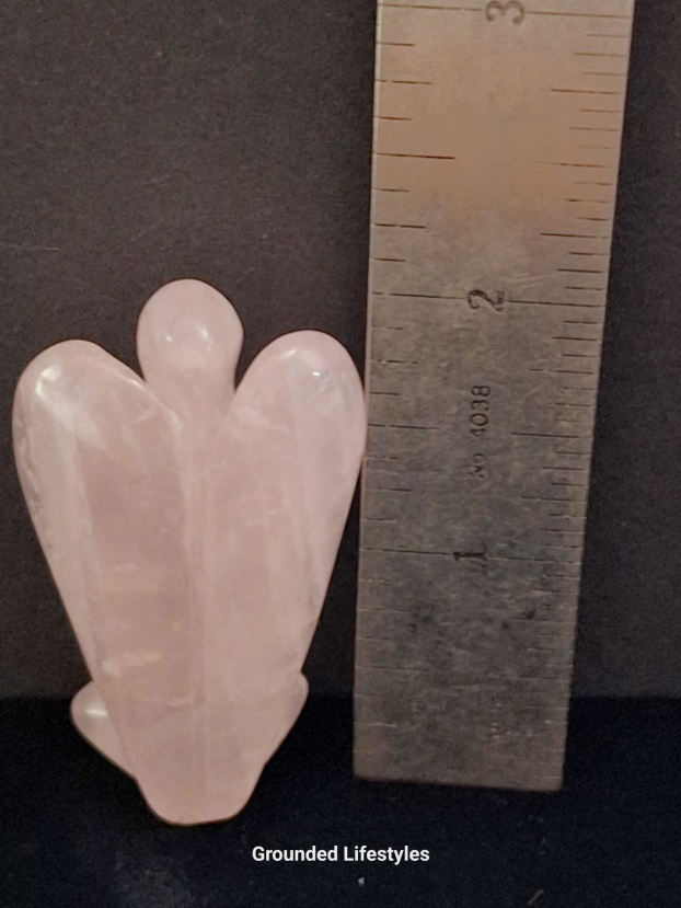 natural rose quartz angel carving from Brazil in soft translucent pink
