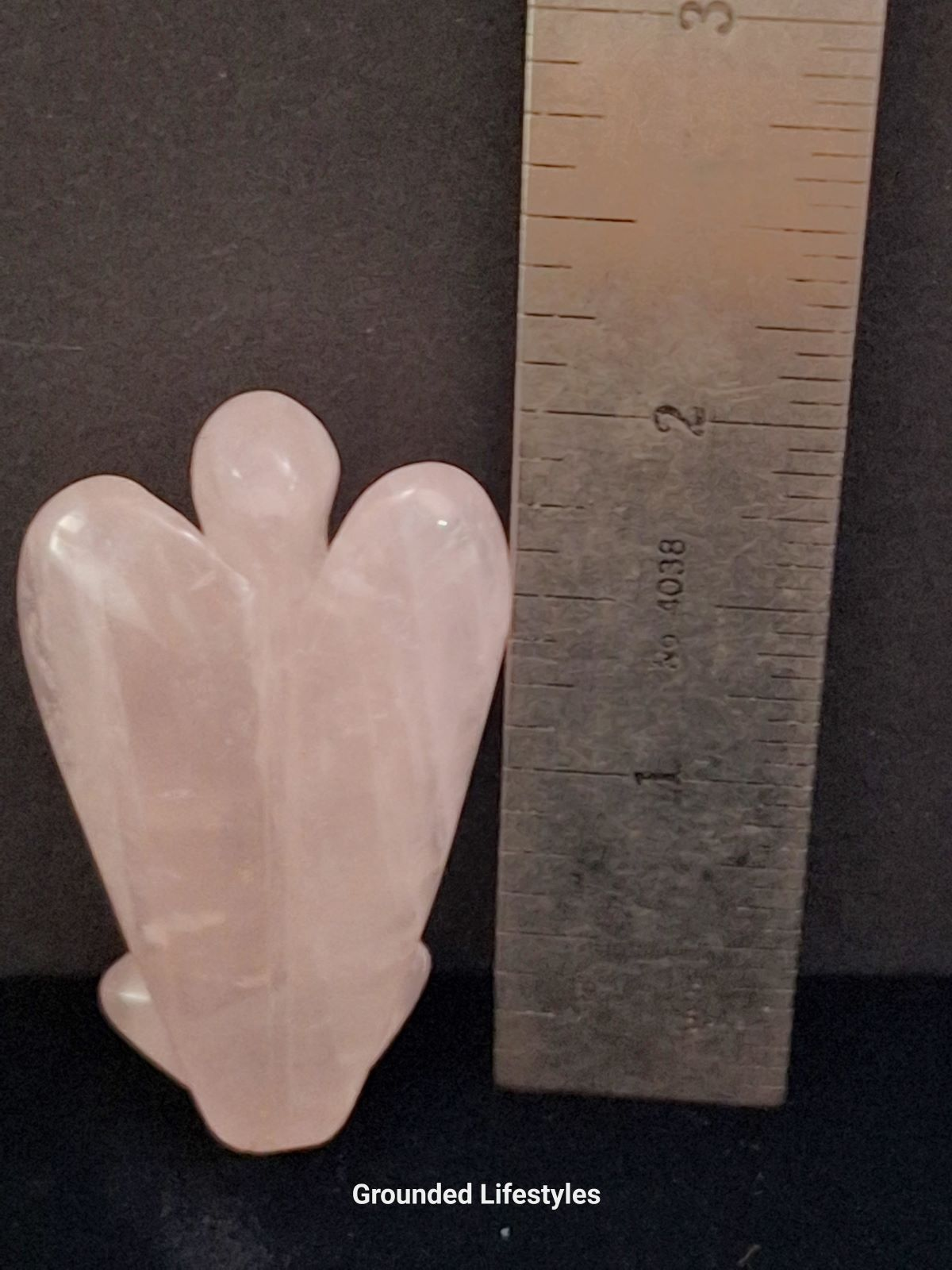 natural rose quartz angel carving from Brazil in soft translucent pink