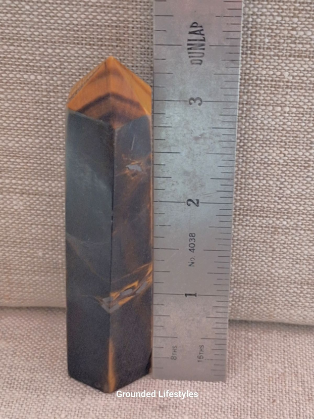 polished tiger eye point 3.5 inch showing shifting gold bands