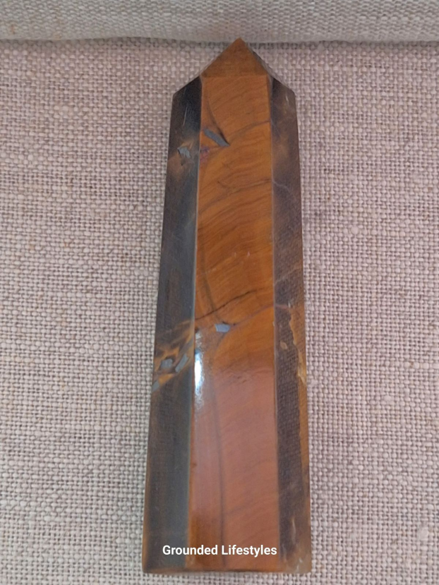 polished tiger eye point 3.5 inch showing shifting gold bands