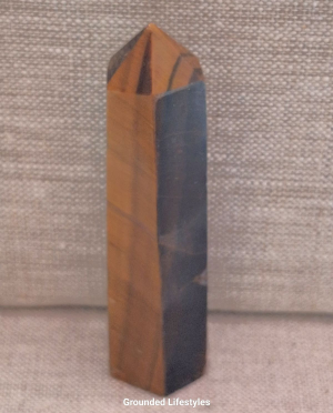polished tiger eye point 3.5 inch showing shifting gold bands