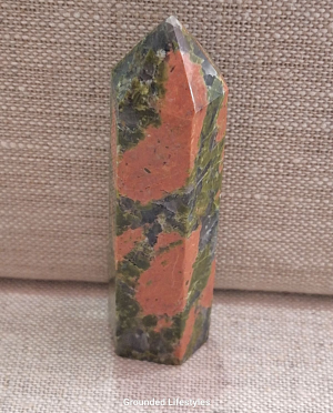polished unakite 3.25 inch point showing natural granite patterns