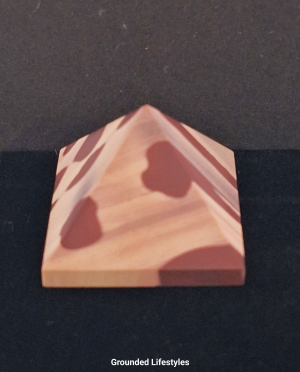 natural zebra stone pyramid 1.25 inch showing red and cream stripes